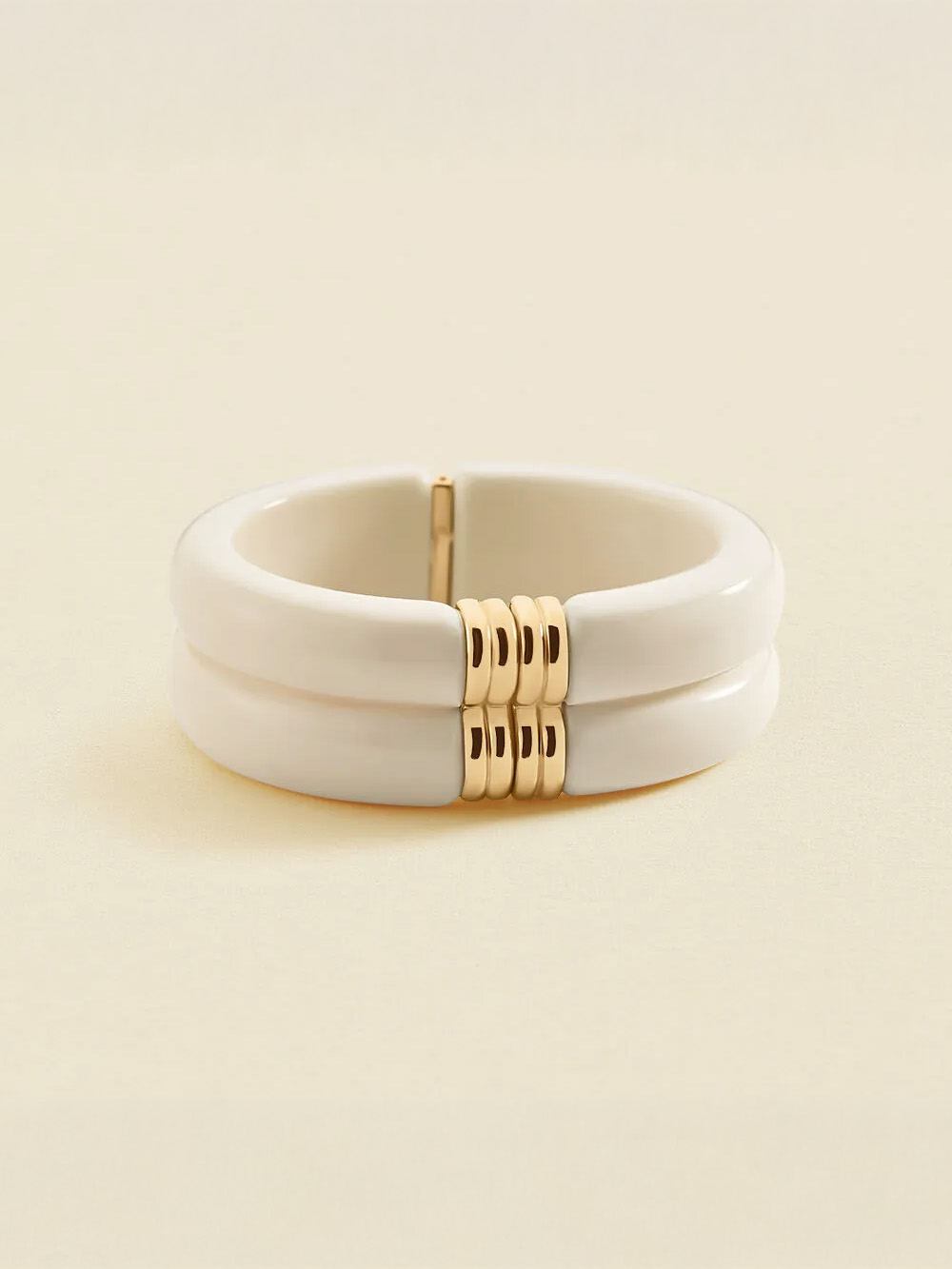Pulsera rígida Agatha Paris Palais Royal de resina marfil y baño de oro 02470350-730-TU