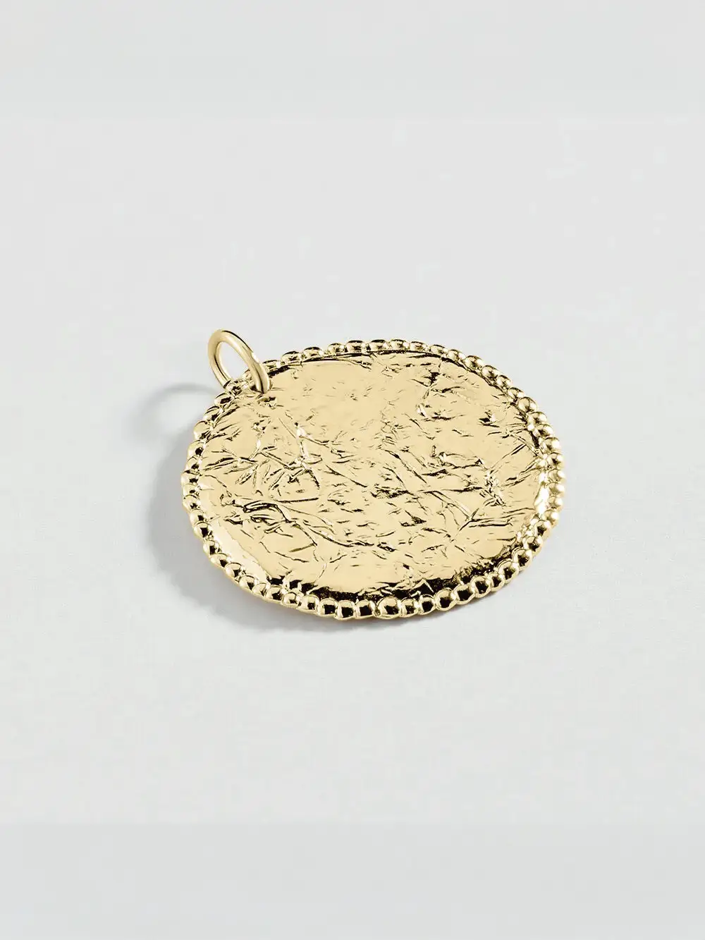 Colgante AGATHA PARIS TALISMANS medalla texturizada dorada 02880134-157-TU